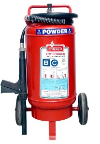 Multiple Red Fire Extinguishers stored in a building corridor